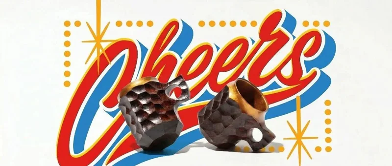 《CHEERS!》vol.1 的 JINCUP 專題橫幅,木杯置於彩色標題前
