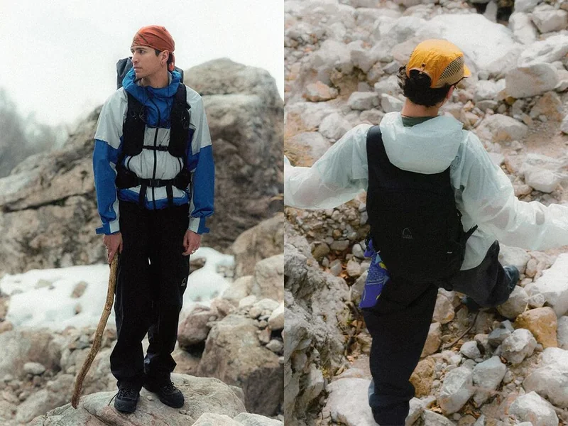 兩名穿着 Sierra Designs 戶外服裝的人在岩石地形行走