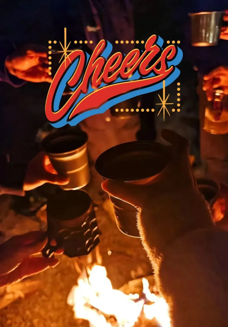 Two wooden cups by a campfire with the CHEERS! title.
